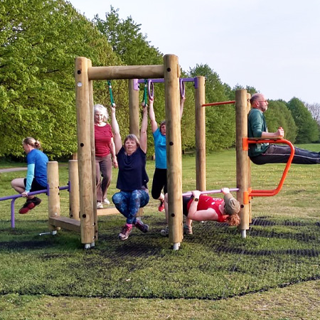 Group using outdoor gym equipment run by Move the Masses charity